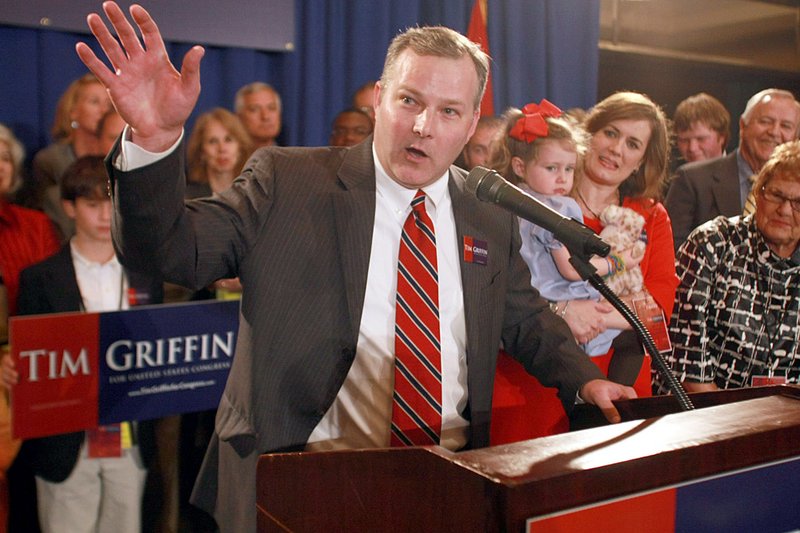 Tim Griffin makes remarks in Little Rock on Tuesday after winning the 2nd Congressional District seat. At his side are his wife, Elizabeth, and daughter Mary Catherine, 3. 