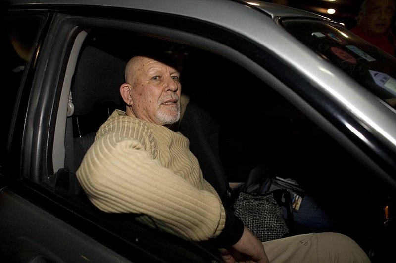 Yair Klein, wanted in Colombia, waits to leave the airport near Tel Aviv, Israel, early Saturday. 