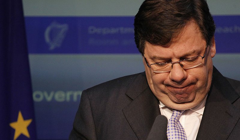 Irish Prime Minister Brian Cowen pauses as he speaks to the media Sunday in Dublin about Ireland’s request for financial aid. 