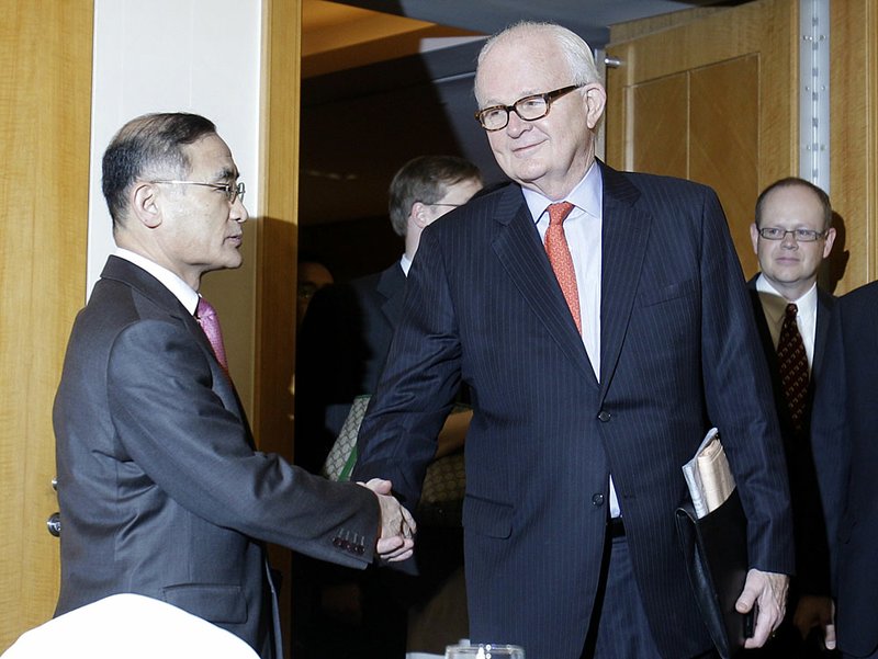 U.S. nuclear envoy Stephen Bosworth is greeted by his South Korean counterpart Wi Sung-lac before their meeting today in Seoul, South Korea. 