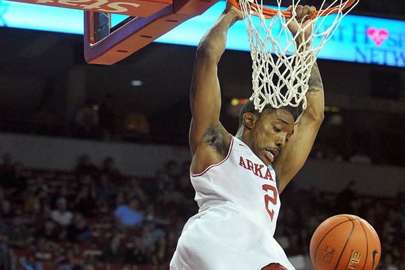 Arkansas forward Jemal Farmer dunks during the Razorbacks’ 90-47 victory over Florida Gulf Coast on Monday at Walton Arena in Fayetteville. 