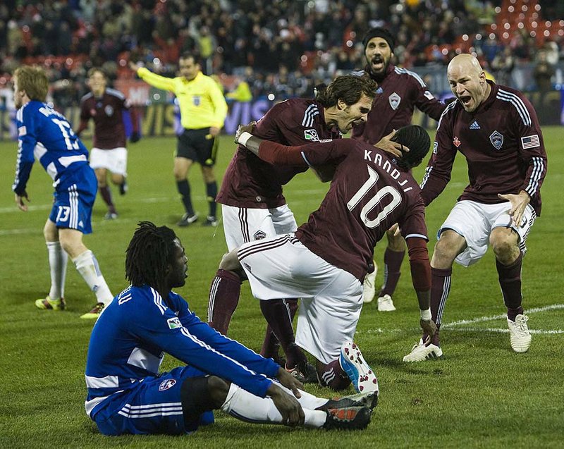 The Colorado Rapids’ Macoumba Kandji celebrates Sunday after his shot was deflected for the game-winning goal in a 2-1 victory over FC Dallas in the MLS Cup. 