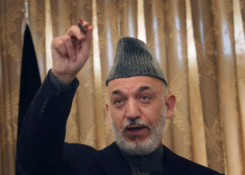 Afghan President Hamid Karzai on Tuesday denied reports that he met with an impostor claiming to be a high-ranking Taliban official. 
