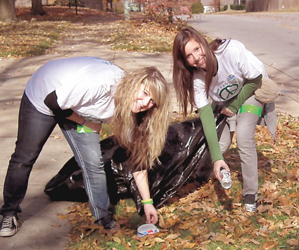 Courtney Paige-Lawrence and her friend Lauren Romero picked up trash along Mount Olive Street in Siloam Springs on Nov. 13 during Courtney’s birthday party.
