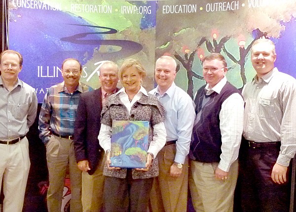 River Watershed Partnership - Representatives of AEP-SWEPCO receive the Golden Paddle Award for the corporation's support of the conservation efforts of the Illinois 
