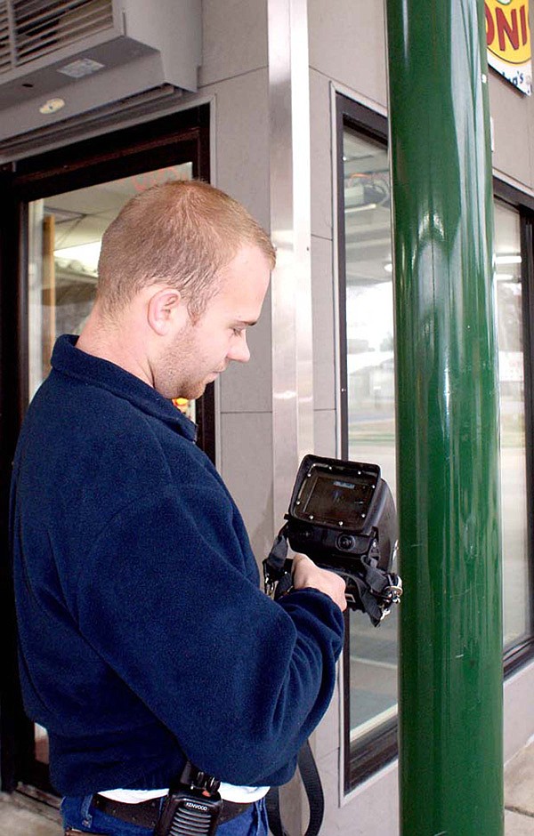 Gravette fireman Spencer Gillming demonstrated the fire department's thermal imaging camara used to locate "hot spots" when a blaze is not visible.