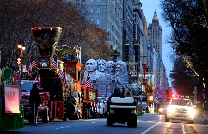 Parade floats line up along Central Park West in New York before the start of the Macy's Thanksgiving Day Parade Thursday, Nov. 25, 2010.