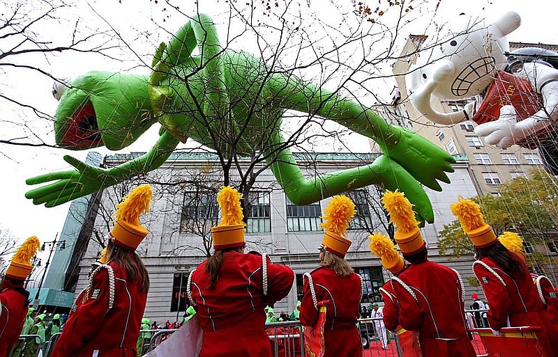 Kermit the Frog and Diary of a Wimpy Kid balloons are prepared Thursday at the Macy’s Thanksgiving Day Parade in New York.

