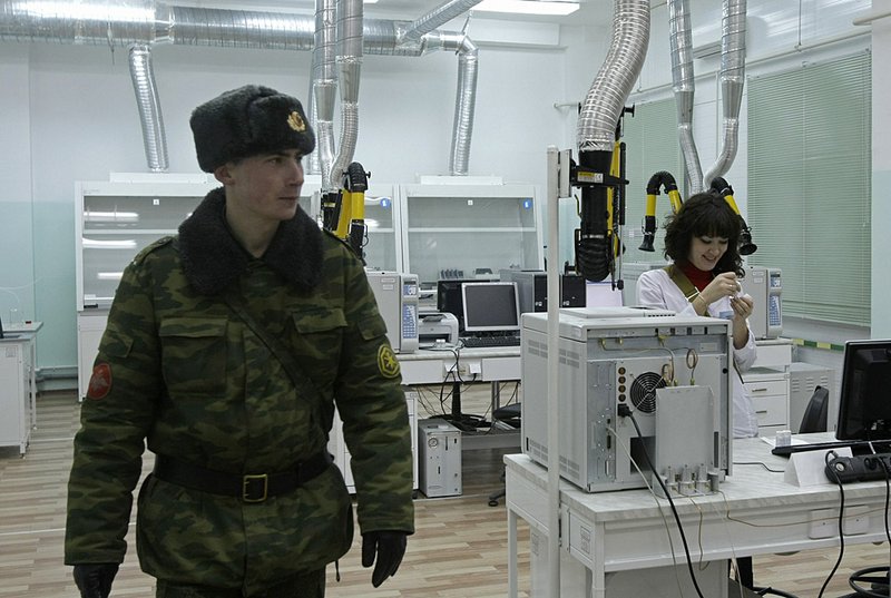 A Russian officer walks through a laboratory Friday at a new plant in Pochep that dismantles chemical weapons. 