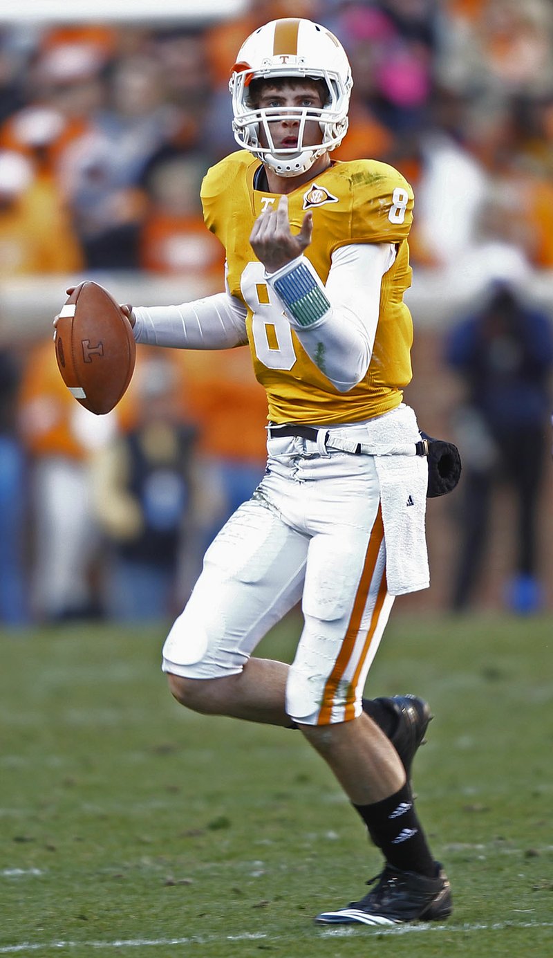 Tennessee quarterback Tyler Bray passed for 354 yards and two touchdowns to lead the Volunteers to a 24-14 victory over Kentucky on Saturday in Knoxville, Tenn. 