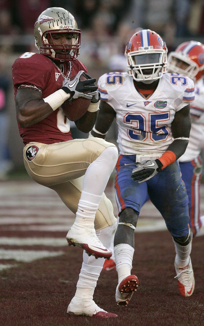 Florida State receiver Taiwan Easterling catches a 15-yard touchdown pass Saturday from Christian Ponder in the Seminoles’ 31-7 victory over Florida in Tallahassee, Fla.

