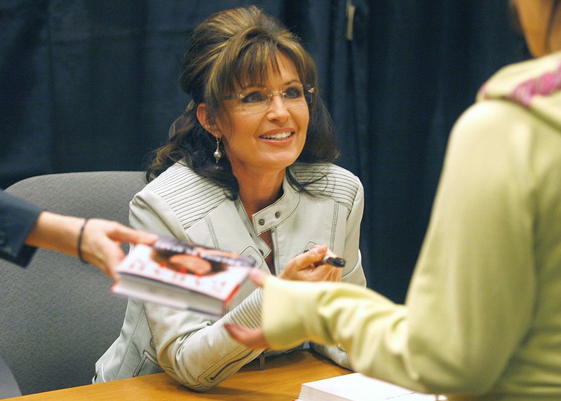 Sarah Palin signs copies of her book this past week at a Barnes & Noble in Phoenix. She’ll make a stop at the Sam’s in Little Rock on Tuesday.