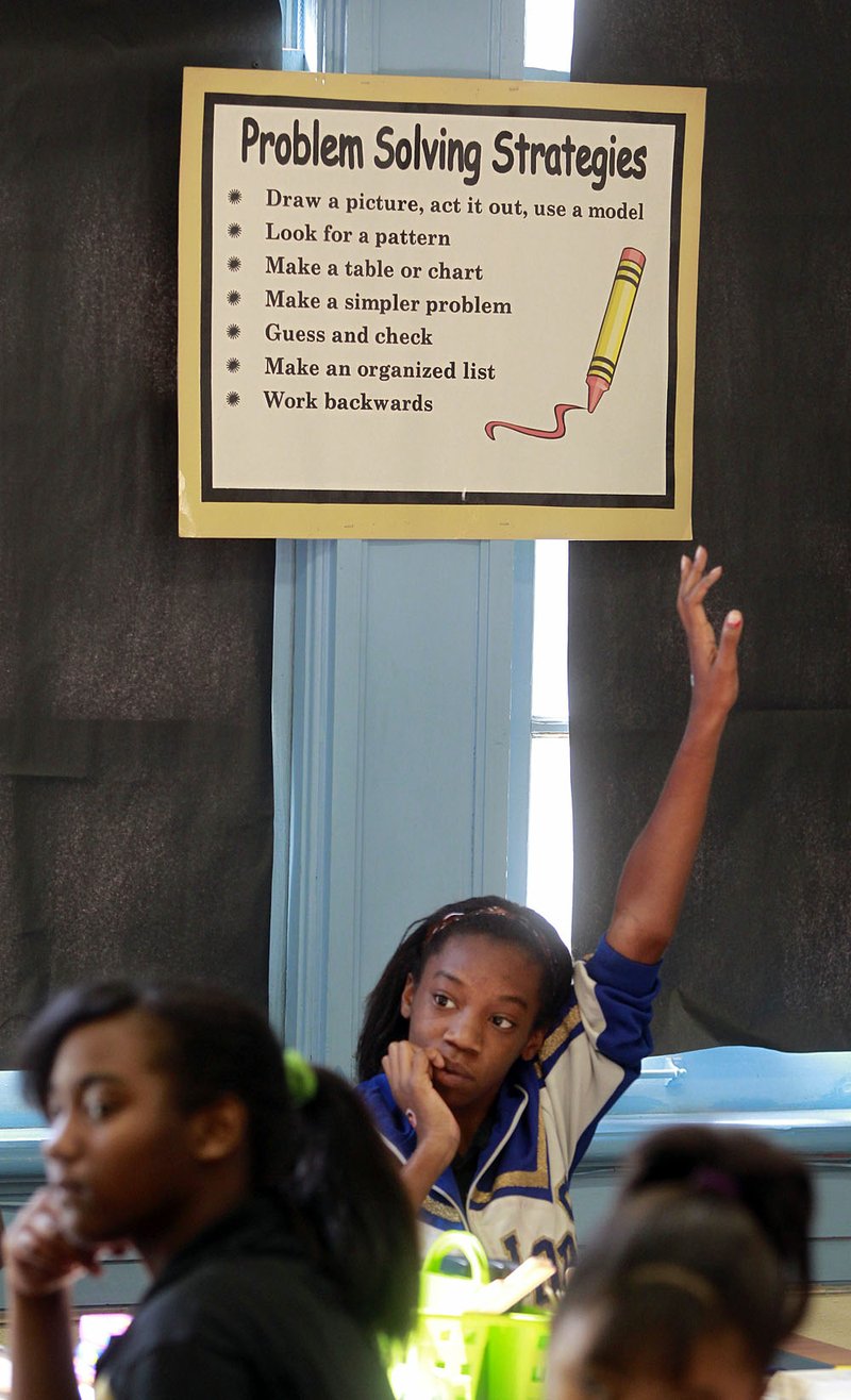 Eighth-grade student Doneicha Sawyer raised her hand in her algebra class at the Sophie B. Wright Charter School in New Orleans.

 

