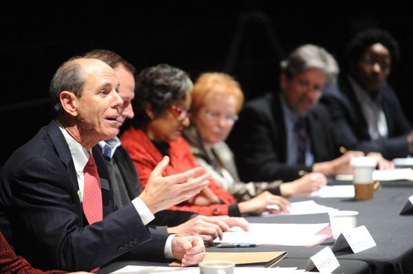 Peter B. Lane, left, president and CEO of the Walton Arts Center, speaks Wednesday during a presentation of the recommendations of the center’s Facilities Committee in Fayetteville. Lane announced during a news conference earlier the center would build a 2,200-seat venue in Bentonville and a 600-seat venue in Fayetteville.