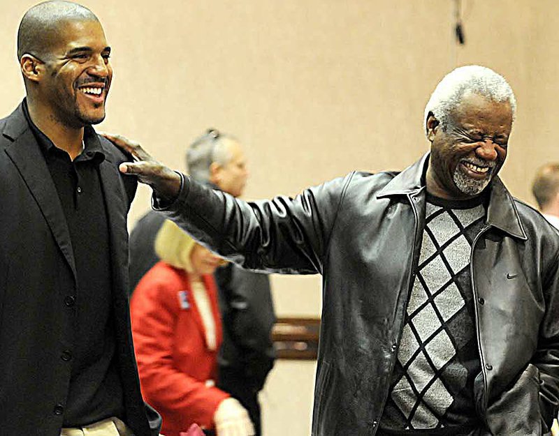 Former Arkansas Coach Nolan Richardson (right) is expected to be in attendance tonight when his former All-America forward and current Central Arkansas Coach Corliss Williamson (left) leads the Bears against No. 13 Missouri. It’ll be a reunion of sorts, because the Tigers are coached by Richardson’s former assistant Mike Anderson. 