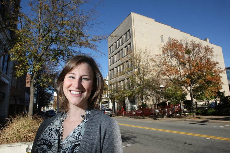 Vanessa McKuin, executive director of Historic Preservation Alliance, outside  of the old Gus Blass Co. building at 315 S. Main Street in Little Rock.