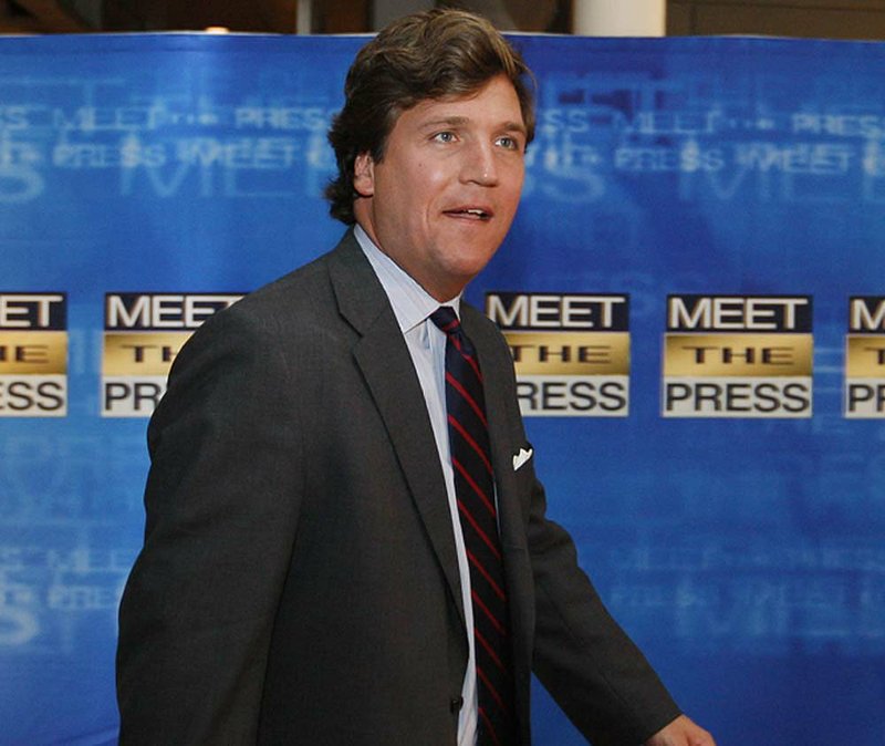  FILE - In this Nov. 17, 2007 file photo, political commentator Tucker Carlson arrives for the 60th anniversary celebration of NBC's Meet the Press at the Newseum in Washington. 