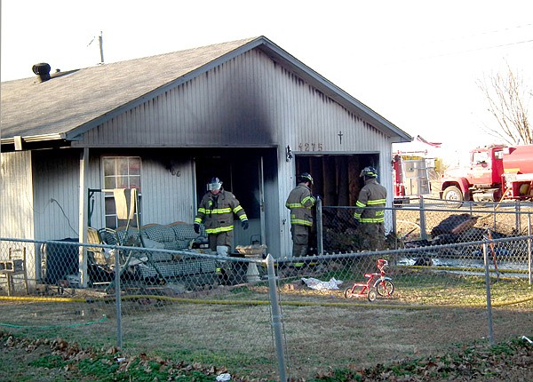 Firefighters began sorting through what was left of a home on 1275 Eubanks Street in Decatur after putting out a fire on Sunday afternoon. Five children and four adults were at home when the fire started but all of them made it out safely.