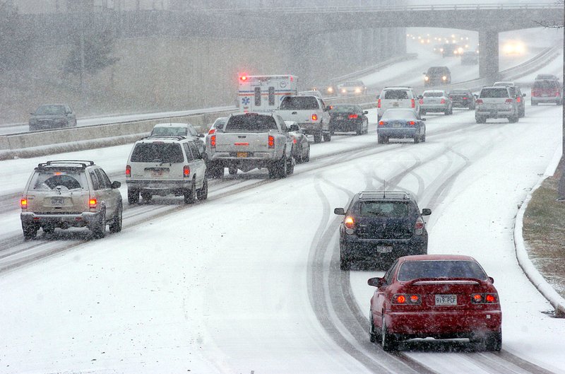 Traffic east bound on I-630 at Fair Park Blvd. backs up due to snow in Little Rock on Sunday afternoon.