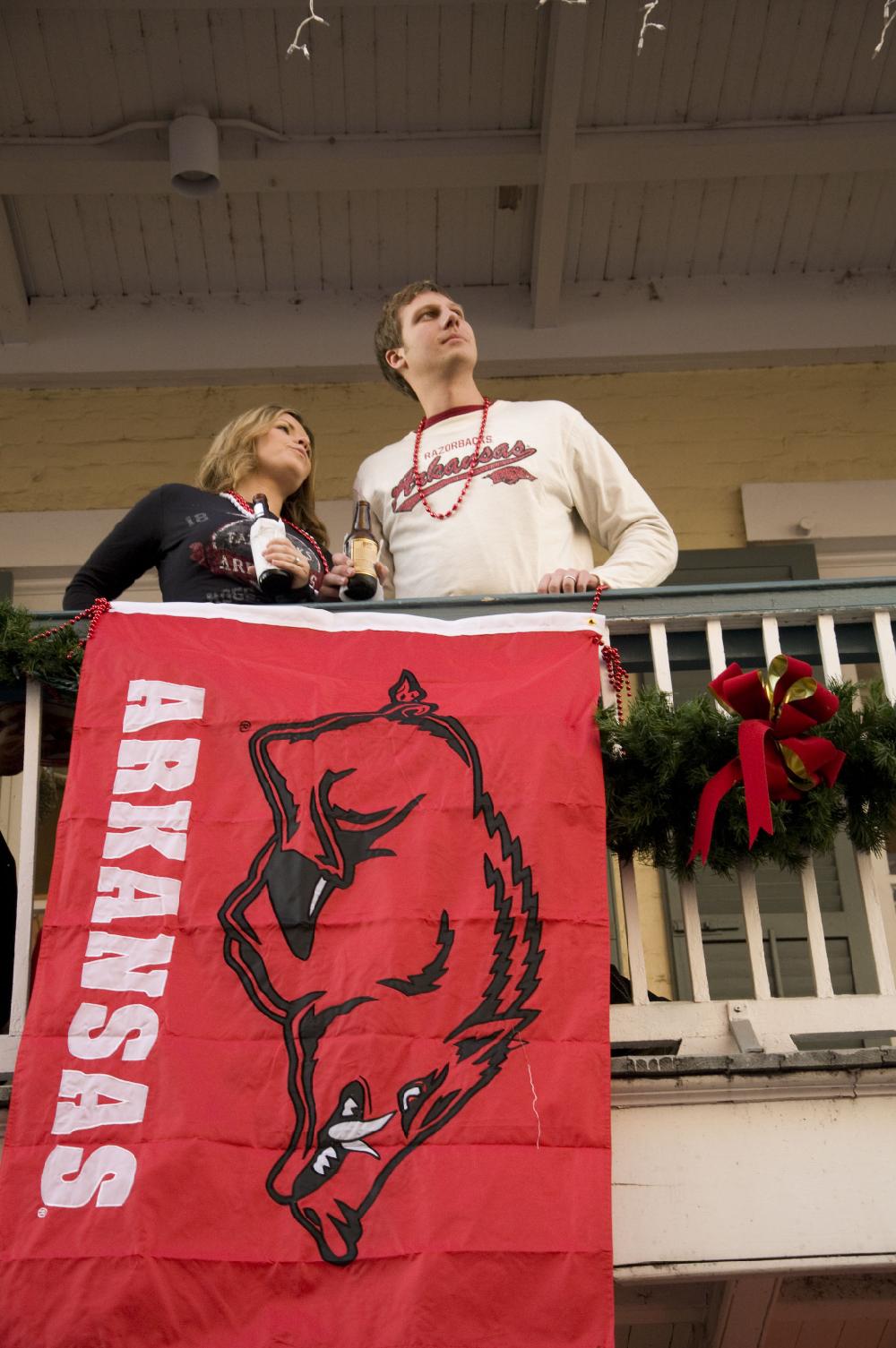 Arkansas Democrat Gazette photo by Cary Jenkins
Hog fans on a balcony on Bourbon Street