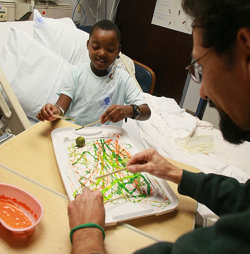 Arkansas Children’s Hospital artist-in-residence Hamid Ebrahimifar and heart-transplant patient Kendrick Stigger, 7, prove you don’t have to be practiced, only willing, to make art.

