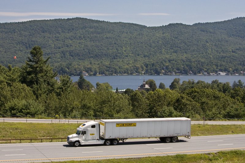 FILE - A J.B. Hunt Transport Services Inc. truck travels north on Interstate 87 past the village of Lake George, New York in this Aug. 14, 2006, file photo.