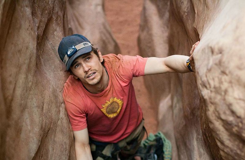 Aron Ralston (James Franco) in happier times in Danny Boyle’s 127 Hours. 