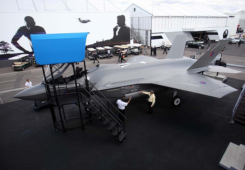  A Lockheed Martin Corp. F-35 Lightning II fighter jet sits on display on the third day of the Farnborough International Airshow in Farnborough, U.K., on Wednesday, July 21, 2010. 