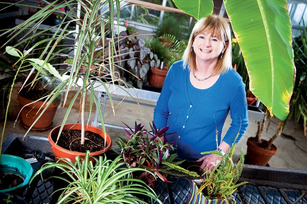 Hendrix College biology professor Joyce Hardin of Conway stands in a greenhouse on campus that includes some of her own plants. Hardin, who has a doctorate in crop physiology, was given the Exemplary Teacher Award from the General Board of Higher Education and Ministry.