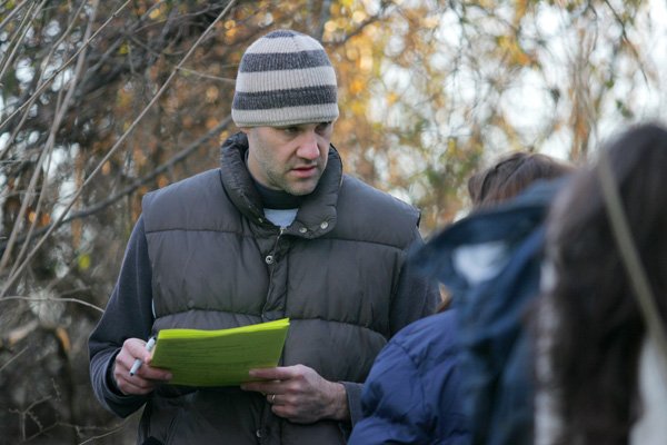 Scott Page of Rogers collects survey information from a homeless woman in Fayetteville in late January. Other volunteers sought out the homeless living in wooded areas near the city to collect census data on the homeless population nationwide as part of the biannual Point-In-Time survey.
