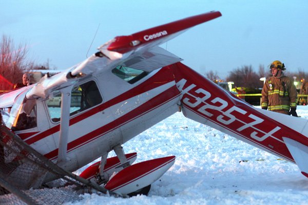 Plane Crashes By Jones Center; 2 Hurt 