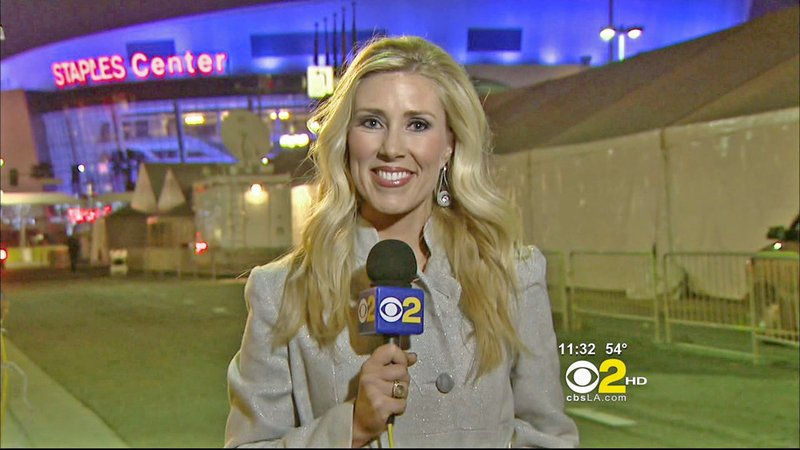 In this Sunday, Feb .13, 2011 undated handout file photo provided by KCBS in Los Angeles, veteran TV journalist Serene Branson reports on the Grammy awards show outside the Staples Center in Los Angeles. 