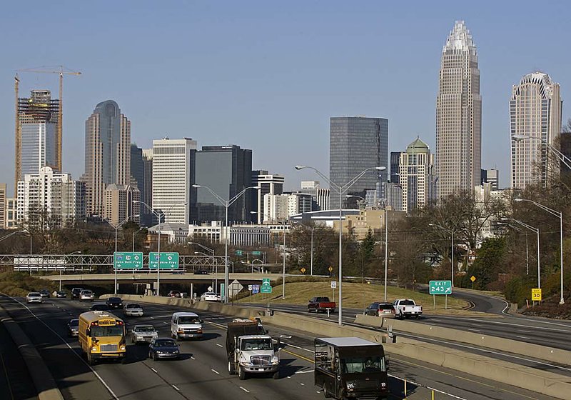 Bank of America, the corporate headquarters of which (second from right) dominates the skyline in Charlotte, N.C., has a new policy for workers who give notice that they’re leaving the firm. 