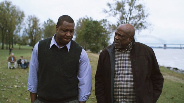 Sam Wright, portrayed by Michael Higgenbottom, left, talks with George Wright, portrayed by Louis Gossett Jr., in a scene from “The Grace Card.”
