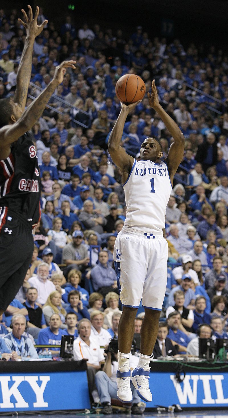 Kentucky’s Darius Miller shoots a three-pointer Saturday during the second half of the No. 22 Wildcats’ 90-59 victory over South Carolina at Rupp Arena in Lexington, Ky. Miller scored a career-high 22 points for Kentucky, which travels to Fayetteville on Wednesday to face Arkansas. 