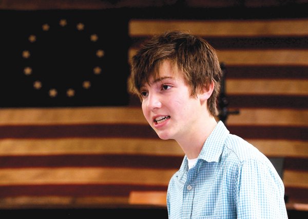 Joel Wood, a Bentonville High School junior, competes Saturday in the Bailey & Oliver Law Firm Speech Competition at the firm’s office in Bentonville. Twenty Bentonville students took part in the competition, each speaking six minutes before an assembly of judges. The contest was won by Kelsey Cain Myers, also a junior.
