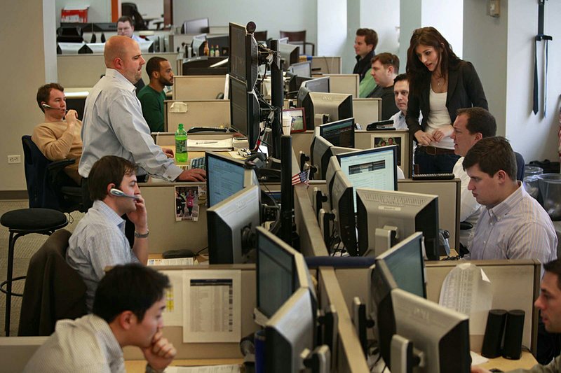 SecondMarket&apos;s private-share brokers sit together in the company&apos;s Wall Street office, January 28, 2011, in New York. The firm has brokered $500 million in trades since launching its private-share market about two years ago. 