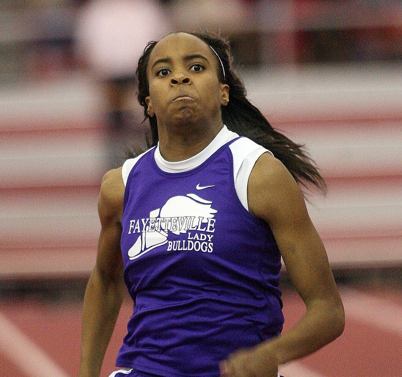 HIGH SCHOOL TRACK AND FIELD Bulldogs, Lady Tigers repeat The