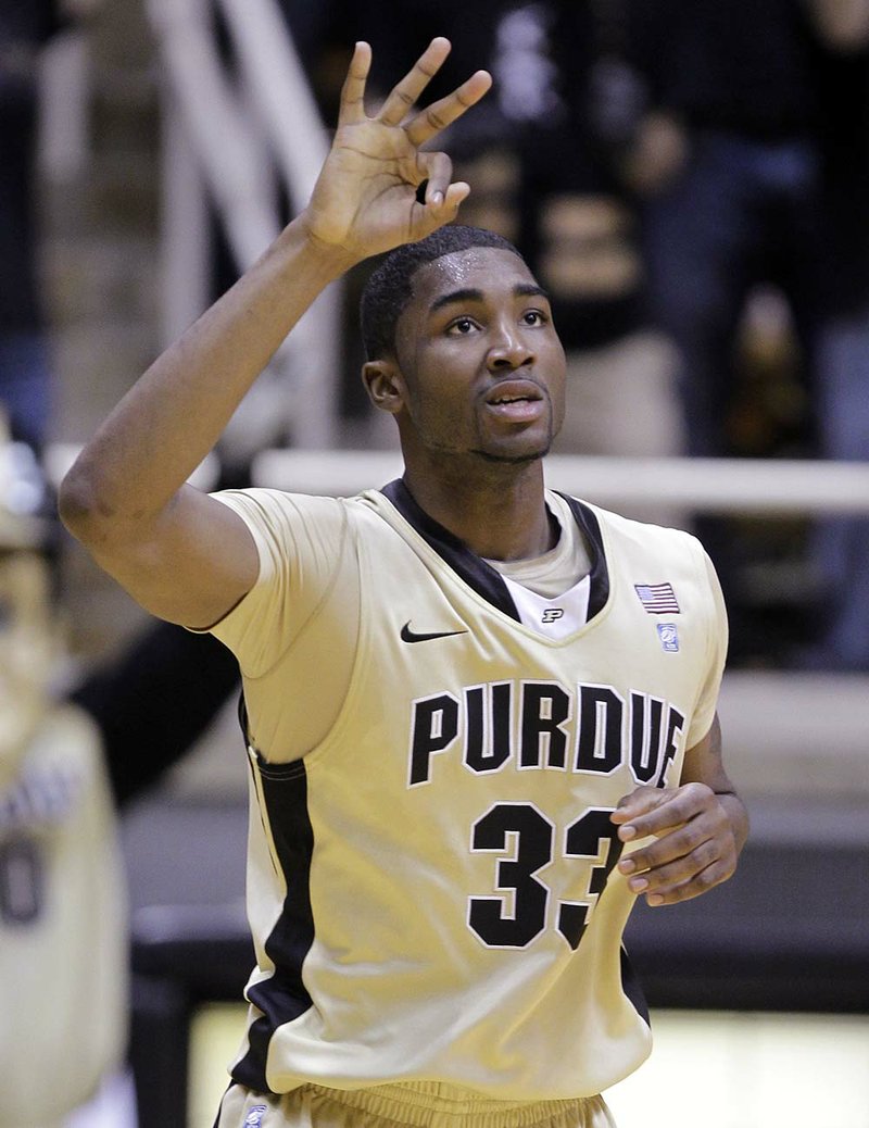 Purdue guard E’Twaun Moore scored 38 points and hit seven three-pointers in the No. 11 Boilermakers’ 76-63 victory over No. 3 Ohio State on Sunday.

