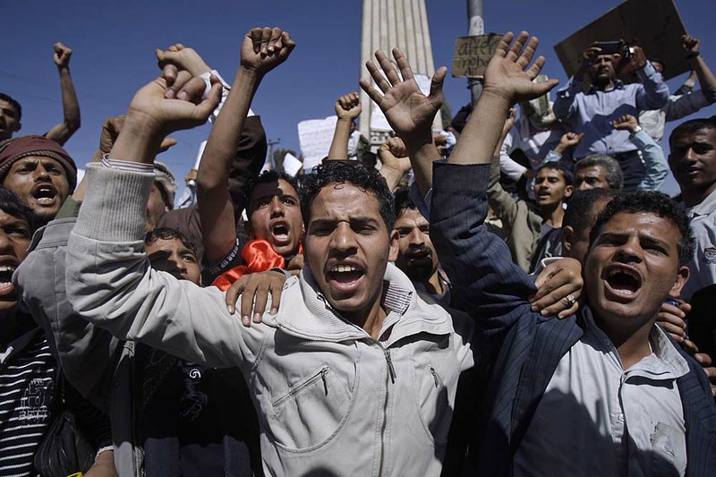 Yemeni anti-government demonstrators demand the resignation of President Ali Abdullah Saleh in Sana, Yemen, on Sunday. 