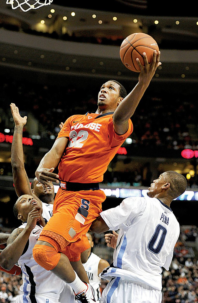 Syracuse forward Rick Jackson (right) scored 18 points to help the 17th-ranked Orange pick up their sixth victory over a ranked opponent, beating No. 15 Villanova 69-64 on Monday.  