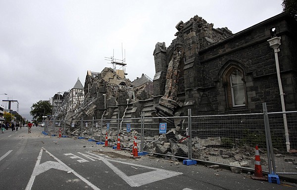 A building in Christchurch, New Zealand, is destroyed after an earthquake struck Tuesday, Feb. 22, 2011. The 6.3-magnitude quake collapsed buildings and is sending rescuers scrambling to help trapped people amid reports of multiple deaths. 