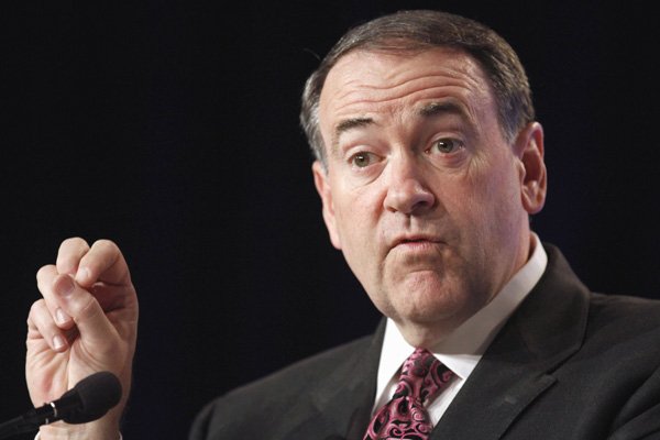 FILE - In this Sept. 17, 2010, file photo, former Arkansas Gov. Mike Huckabee speaks in Washington. Huckabee isn’t tamping down speculation of another presidential run. He also isn’t doing much to prepare for one. 