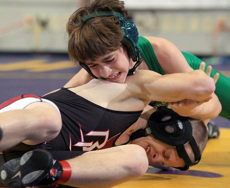 State High School Wrestling Tournament: Conway relies on team concept