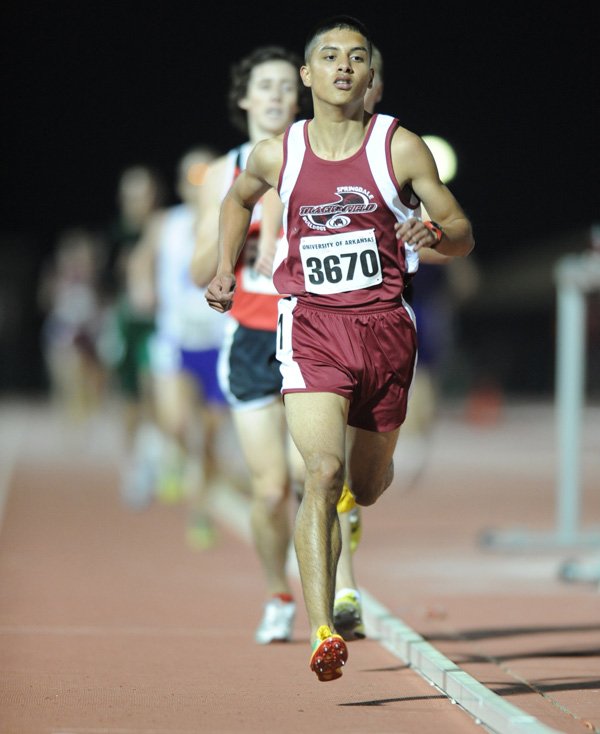  Springdale junior Gabe Gonzalez leads the field on his way to a win in the 3,200 meters in a time of 9:26.03, the 13th fastest time for an Arkansas high school athlete April 9, 2010, at John McDonnell Field in Fayetteville.
