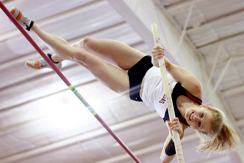 Arkansas junior Tina Sutej set the national collegiate indoor pole vault record with a clearance of 14 feet, 10 3/4 inches on Sunday during the SEC Indoor Track Championships at the Randal Tyson Track Center in Fayetteville. Arkansas’ men and women finished second in the team standings. 