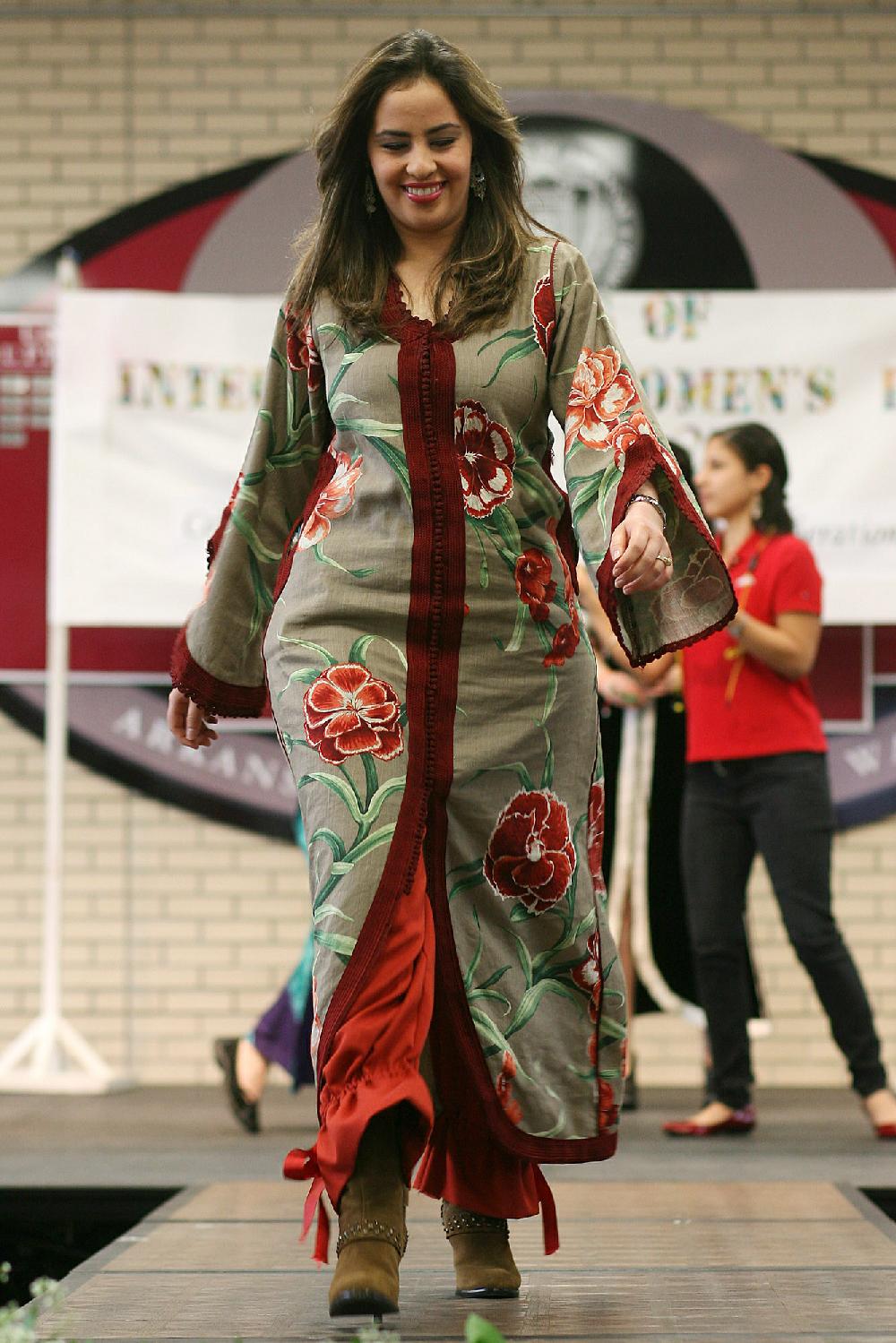Arkansas Democrat-Gazette/WILLIAM MOORE
Freshman Khaoula Charahbili-Harouchi (cq) from Morocco sports a Caftan while participating in an international fashion show Tuesday, March 8, 2011 inside the Union on the University of Arkansas campus in Fayetteville.  The show was part of a centennial celebration of International Women's Day.