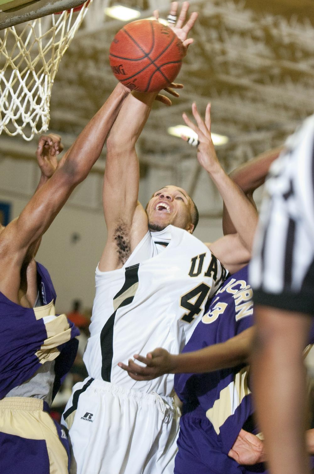 Arkansas Democrat-Gazette/KAREN E. SEGRAVE
2/14/11
UAPB's Daniel Broughton (44) leaps for the basket against Alcorn State Monday night at UAPB.