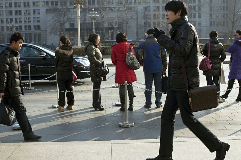 Real Chinese men carry purses The Arkansas Democrat Gazette