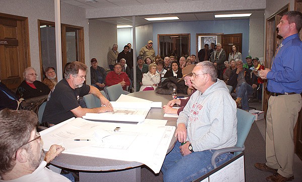There was standing room only at the Monday night meeting of the Gravette Planning and Zoning Commission when it took up plans related to a new Walmart store on the south side of the city.